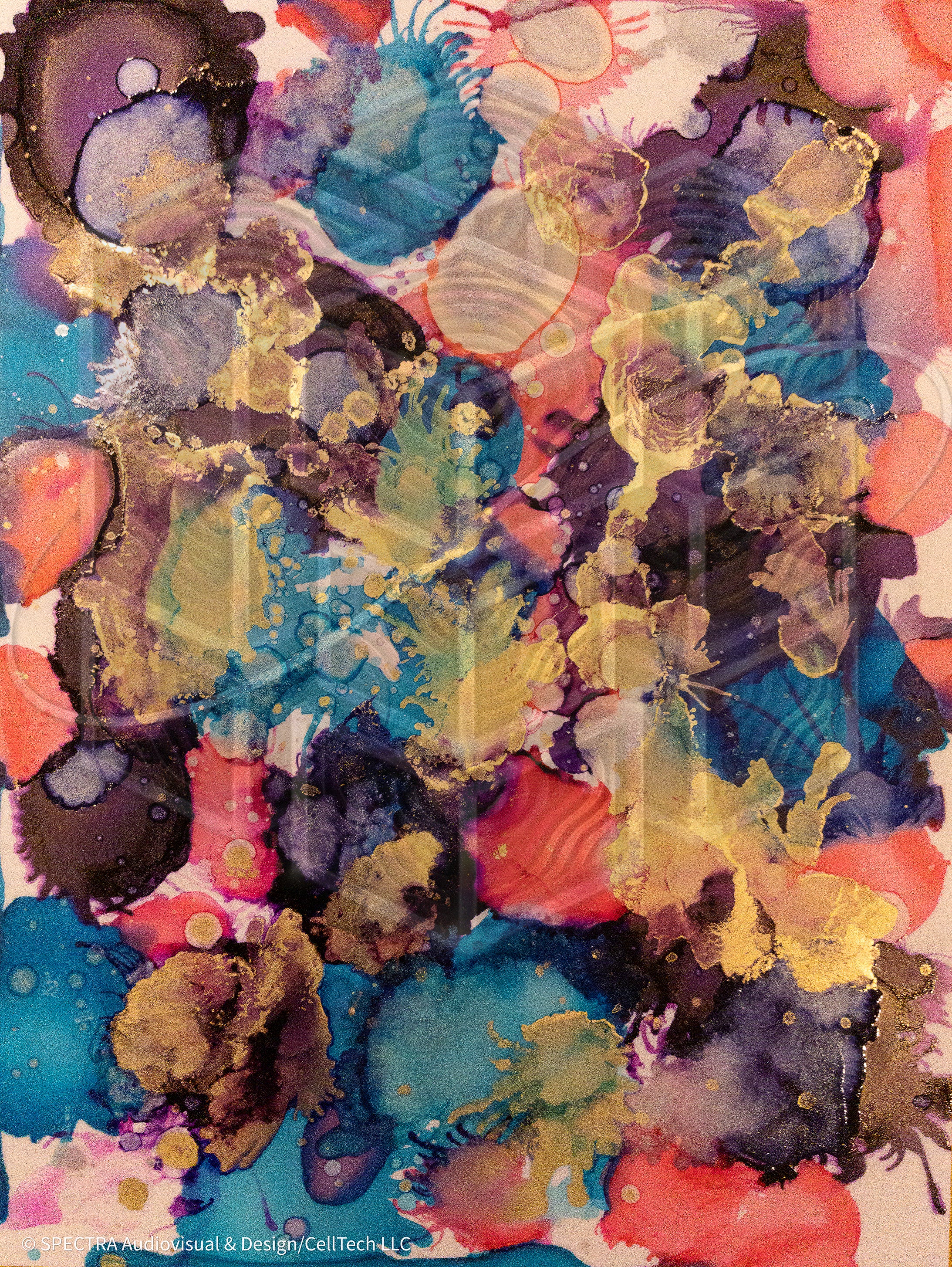 Abstract art with colorful splashes of paint on a textured surface